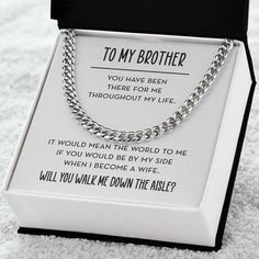 a box that has a necklace in it on top of a carpeted floor with the words, to my ben's dad