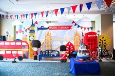 an indoor birthday party with decorations and cake