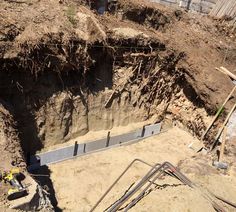 a large hole in the ground that is being dug