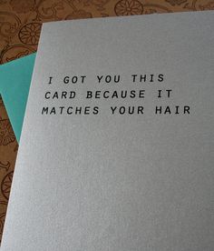 two cards that say i got you this card because it matches your hair on them