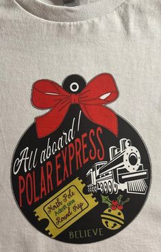 a t - shirt that says all aboard polar express