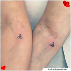 two people with matching tattoos on their legs