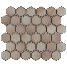 a white and beige mosaic tile with hexagonal tiles on the back side,