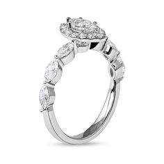 When you propose, present her with this gorgeous diamond engagement ring. Created in cool 10K white gold, this design showcases a 1/3 ct. marquise-cut diamond sparkling in a halo of round diamonds. Shimmering 1/10 ct. marquise-cut diamonds line the shank. Radiant with 1 ct. t.w. of diamonds and a brilliant buffed luster, this engagement ring makes the moment magical. Diamond Frame, Marquise Cut Diamond, Marquise Cut, Showcase Design, Diamond Engagement Ring, Round Diamond, Diamond Engagement, Diamond Engagement Rings, Round Diamonds