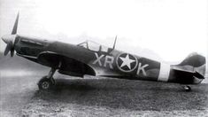 an old black and white photo of a fighter plane