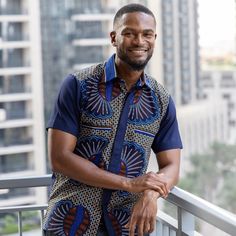 This men's shirt is made from the finest poly-cotton fabric with accents of African print fabric also known as Ankara fabric and hand woven smock (fugu) fabric.  All our clothes are made in Ghana with the finest craftsmanship. This African shirt comes in various sizes from Medium to Extra Extra Large. The size chart in the photos shows the various measurements. The breast pocket strips and collar are made of handwoven smock fabric made by women in Northern Ghana. We offer custom sizes if you would prefer that. Custom-made sizes take 5 to 10 working days to process and come at a 10% extra charge. Ankara Shirts For Men, African Shirt, Mens Dress Shirts, Fabric Gift Wrap, Shirt Designs For Men, African Shirts, Navy Man, African Wax Print, African Print Fabric