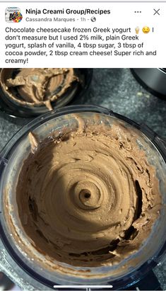 a bowl filled with chocolate frosting on top of a counter