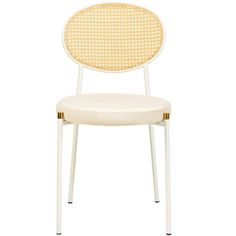 a white chair with a yellow dot back and seat cover on it's side