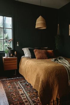 a bedroom with a bed, rug and window in the corner that is dark green