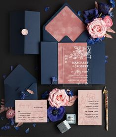 the wedding stationery was done in navy and pink