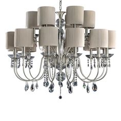 a large chandelier with many lamps hanging from it's sides and shades of beige