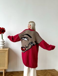 This unique pop-art style knitted cardigan is fully handmade of high quality wool blend yarn. The picture on the back is embroidered by hands. This cardigan can be customised. You can choose the colours you prefer. Handmade One-size Sweater, Handmade Sweater Coat, Trendy Handmade Knit Sweater, Handmade Oversized Sweater, Handmade Oversized Sweater Coat, Trendy Handmade Knit Cardigan, Handmade Oversized Trendy Cardigan, Handmade Trendy Cardigan For Winter, Trendy Handmade Cardigan For Winter