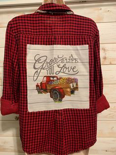 One of a kind repurposed women's flannel shirt with throw a little love graphics on the back, 100% cotton, size large Repurposed Flannel Shirts, Fall Gingham Cotton Shirt, Gingham Cotton Flannel Shirt For Fall, Fall Gingham Cotton Flannel Shirt, Spring Gingham Flannel Cotton Shirt, Fall Cotton Flannel Shirt With Graphic Print, Plaid Cotton Flannel Shirt With Graphic Print, Womens Flannel Shirt, Flannel Shirts