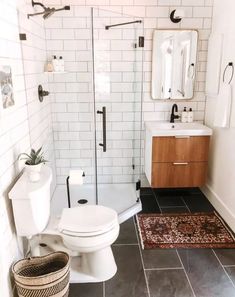 Thinking of incorporating minimalist design into your bathroom? Check out this guide to discover 15 simple bathroom design ideas that embrace minimalism! #bathroomremodel Aesthetic Small Bathroom, Tiny Bathroom Storage, Over Toilet Storage, Extra Space Storage, Simple Bathroom Designs, Minimalist Bathroom Design, Bathtub Decor, Over Toilet, Bathroom Design Ideas