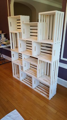 a large wooden shelf sitting on top of a hard wood floor