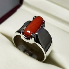 "Red Coral /Moonga 4.00-11.00 Ct. Stone 92.5 Sterling Silver Ring For Men & Women. This ring is suitable for Men & Women having ring sizes between 4.25 to 12.00 as per US ring standards. Size of this ring is easily by hand. Fine quality Red Coral is used to give best results for your astrological needs. Stone will be neat and clean without blemishes. Gemstone is left open from the back side. Gemstone certified by a Well reputed laboratory. This fashionable flat Rings band is dainty and e Red Coral Rings For Men, Modern Red Cabochon Jewelry, Red Gemstone Jewelry With Rectangular Stone, Red Rectangular Gemstone Jewelry, Fine Jewelry With Red Rectangular Stone, Formal Sterling Silver Rings With Natural Stones, Formal Natural Stones Gemstone Ring, Classic Rings With Natural Stones, Ruby Jewelry With Large Round Stone