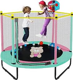 two children jumping on a trampoline net with balls and a teddy bear toy