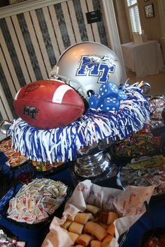 a football themed party with snacks and food