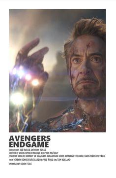 the avengers endgame movie poster with iron man holding his hand up in front of him