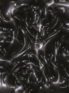 an abstract black and white photo with swirly lines on it's surface,