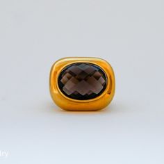 Chucky Statement Cognac Quartz ring 18K Yellow Gold Quartz Approx 3tcw The frame of the ring 21mm x 18mm16.9gmSize 7 Resize available, contact for more info. Thank you for visiting our shop!Also, Follow us on Instagram https://www.instagram.com/dmkjewelryny/ Formal Gold Cabochon Signet Ring, Luxury Cabochon Signet Ring For Formal Occasions, Luxury Formal Signet Ring With Intaglio, Luxury Brown Jewelry For Formal Occasions, Gold Gemstone Signet Ring For Formal Occasions, Formal Brown Gemstone Ring, Elegant Brown Rings For Formal Occasions, Brown Polished Finish Signet Ring For Formal Occasions, Formal Brown Signet Ring With Polished Finish