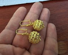 ★ Largest size of our traditional Croatian filigree ball earrings 1.5 cm ( 0.6") in diameter, handcrafted in solid 14k gold. They are replicas of ethnic - heritage Croatian jewelry from Dubrovnik - Dalmatia region.  Earrings end with decorative, secure - latching type of ear-wires. ★ *These earrings are handmade on order in 7-10 business days* Due to the handmade creation, every pair is unique, so there can be tiny variations in dimensions of the finished earrings. They are on average: Overall l Elegant Round Bridal Earrings For Ceremonies, Ceremonial Earrings With Intricate Design, Formal Pierced Earrings For Festivals, Gift Yellow Gold Filigree Bridal Earrings, Pierced Bridal Earrings As Festival Gift, Pierced Bridal Earrings For Festive Gifts, Pierced Bridal Earrings For Festivals, Filigree Earrings For Festivals, Round Filigree Earrings For Wedding