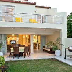 a house with a patio and dining area