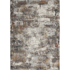 an abstract rug with various colors and textures