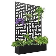 an outdoor wall planter with plants and flowers