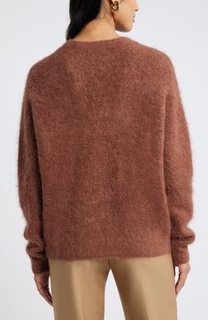 A fuzzy texture turns up the cozy quotient for an endlessly wearable crewneck sweater. Crewneck Long sleeves 55% alpaca, 43% nylon, 2% spandex Hand wash, dry flat Imported Fine Knit Mohair Sweater For Fall, Mohair Crew Neck Soft Knit Sweater, Soft Mohair Crew Neck Sweater, Mohair Soft Knit Crew Neck Sweater, Mohair Sweater With Soft Knit And Crew Neck, Soft Knit Mohair Crew Neck Sweater, Soft Texture Mohair Crew Neck Sweater, Fuzzy Texture, Crewneck Sweater