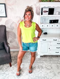 This flirty scoop neck tank is out to give your wardrobe a thrill. With its ruffle trim and relaxed, breezy fit, this top was made for turning heads on steamy summer nights. The soft, lightweight material will keep you cool while the slim straps show off your sun-kissed shoulders. Whether you're meeting your crew for margaritas or embarking on a beachside date, this little number adds a playful pop of romance to any look. After a long winter, you deserve to bare your arms in style. Slip into thi Swim Jewelry, Long Winter, One Piece Swim, Beauty Collection, Keep Your Cool, Summer Nights, Ruffle Trim, Lime Green, Scoop Neck