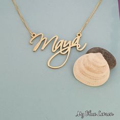 Order any name for your solid 14K gold Maya style nameplate necklace!! A great personalized custom made gift for any occasion!! Birthday, Graduation Or Any Holiday! *Both the nameplate and chain are all solid 14k gold. *Stamped for authenticity 14K. *Nameplate is 0.8 mm high quality thickness. *1.0 cm tall first capital letter. *This listing is for one (1) name with one (1) capital letter only! *In the photo you can view the 1.0 gram box chain. *Choose your twisted herringbone chain length from