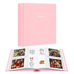 an open pink book with pictures on the pages and two photos in it's center