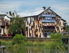 an old building with rusted metal sidings and the words house of blues on it