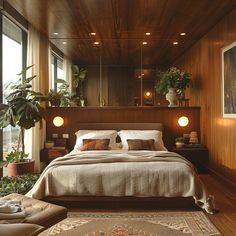 a bedroom with wood paneling and plants on the wall above the bed is lit by two lamps