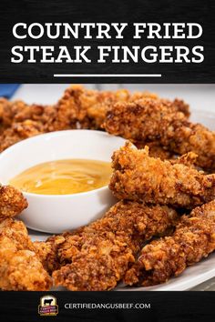 fried steak fingers with dipping sauce on the side and text overlay reading country fried steak fingers