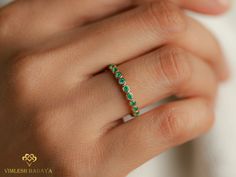 Check out our shop for more items https://www.etsy.com/shop/VimleshBadaya Emerald wedding ring, Stacking ring, Emerald wedding band, Full eternity ring, Zambian Emerald, dainty emerald ring, May birthstone Same design can be made also with other custom gemstones per request. Product details: - Solid gold - approx. 2mm emerald Ring size - US 3 to US 9 (for smaller or larger ring size, please contact) Please select your size at the drop down menu. All orders will be shipped via DHL or FedEx expres Green Gemstone Eternity Band For Wedding, Wedding Stackable Rings In Green With Round Band, Green Stackable Wedding Rings Round Band, Green Round Cut Eternity Band For Wedding, Green Round Cut Wedding Eternity Band, Green Bezel Setting Stackable Rings For Wedding, Green Stackable Rings For Wedding, Green Stackable Wedding Rings, Emerald Half Eternity Ring For Wedding