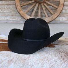 Your little cowboy or cowgirl will look all grown up mutton bustin' in this Youth Resistol Crossroads Jr. Black Felt Cowboy Hat. This Black Crossroads Jr. is made from durable, premium wool, with an elastic sweatband to ensure a snug fit. This hat also features a regular oval, cattleman creased 4-1/4" crown, and black ribbon hat band.Resistol has become the greatest name in western hats. Resistol hats are known for their high quality and long wear, in both felt hats and straw. Felt,Fur One Size Handmade Black Felt Hat For Rodeo, Black Flat Brim Rodeo Hat, Black Cowboy Hat For Ranch, Cowboy Hats Black, Resistol Hats, Black Felt Cowboy Hat, Cowboy Hat Black Felt, Kids Cowboy Hats, Felt Cowboy Hat