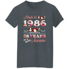 a t - shirt that says made in 1960 with flowers on the front and an image of