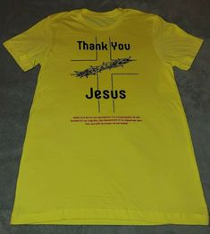 Thank You Jesus Yellow Tee Shirt Just a reminder of Jesus Christ Sacrifice.   Make the Bold Statement.  Celebrate your FAITH. Yellow Tee with Black and Red Ink. High Quality Smooth Tee. All of our shirt are UNISEX. They are a little longer on females than standard made for female only shirts. ** All shirts are made of the highest quality blanks. ** At this time we carry the following sizes: Medium, Large, X-Large, and XX-Large ** Material: 4.2 oz., 100% airlume combed and ringspun cotton, 32 sin Yellow Tees, Peace Be Upon Him, Thank You Jesus, White Tee Shirts, Just A Reminder, Red Ink, Black Tee, Jesus Christ, Black Shirt