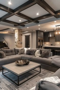 a living room filled with furniture and a fire place in the middle of it's walls