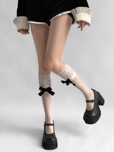 Elevate your summer wardrobe with these elegant lace-trimmed stockings featuring a delicate bowknot detail. Perfect for adding a touch of femininity to any outfit, these socks are made from lightweight, breathable fabric, making them ideal for warm weather.   Please note that this product includes only one pair of stockings. Lace Trim Hosiery, Summer Lace Socks With Lace Trim, Fitted Lace Trim Socks For Summer, Summer Lace Trim Fitted Socks, White Lace Hosiery, White Lace Thigh-high Legwear, Elegant Spring Stockings With Lace Trim, Spring Party Lace Stockings, Elegant Lace Trim Stockings For Spring