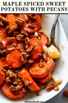 maple spiced sweet potatoes with pecans on a white plate