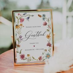 a greeting card sitting on top of a wooden table