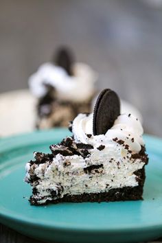 a piece of oreo cookie ice cream pie on a blue plate