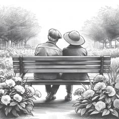 two people sitting on a bench looking at flowers