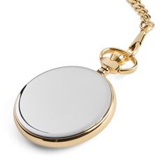 Elevate your style with this stunning open-faced pocket watch for men. Features black Roman numerals and hands, along with a sub-dial that counts the seconds. The slender gold- and silver-toned surgical steel case fits neatly in your pocket for easy access. Runs on Japanese Miyota movement. Watch attaches to your belt or pocket with the sturdy clip at the end of the chain. Designed in Denmark by Seizmont. Comes in an environmentally friendly storage box. Elegant Formal Pocket Watch With Skeleton Dial, Classic Formal Compact Pocket Watch, Luxury Pocket Watch With Subdials For Gift, Luxury Pocket Watch With Subdials As Gift, Timeless Stainless Steel Watch Accessories With Chronometer, Classic Yellow Gold Pocket Watch With Round Dial, Classic Yellow Gold Pocket Watch, Gold Pocket Watch With Skeleton Dial, Formal Pocket Watch With Subdials