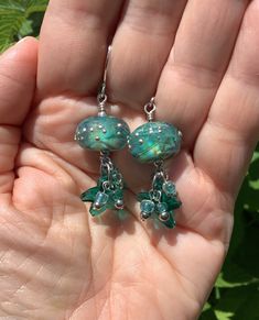 These earrings feature unique artisan-made glass beads, accented with a genuine Swarovski starfish bead, and a cluster of glass seed beads and round silver beads. They're swingy and beachy Czech Glass Beaded Earrings With Spacer Beads For Gift, Gift Czech Glass Beaded Earrings With Spacer Beads, Gift Beaded Earrings With Czech Glass, Beachy Earrings, Teal Earrings, Glass Bead Earrings, Artisan Earrings, Earrings Unique, Bead Earrings