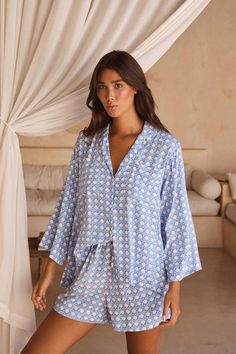 Description The Peta Pajama Sleep Set is irresistibly comfortable, crafted from our signature soft rayon. Features a boxy-cut top with bust pockets and buttons. Very relaxed style fit Boxy shaped button-up collared top with bust pockets High-waisted shorts with elastic drawstring and side pockets Pre-washed 100% Rayon, super soft feel Sizing Stella is wearing a size S/M, and is an Australian 8-10, US size 4-6, approx 5'11 tall. Very relaxed style fit. The following guidelines can be applied to s Resort Wear Men, Bridesmaid Pjs, Sleepwear Women Pajamas, Collared Top, Mens Sleepwear, Long Sleeve And Shorts, Cut Top, Arts District, Sleep And Loungewear