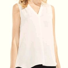 Flattering Ivory Blouse With Drape Neckline Detail That Flows Down The Front. Pull-On Style With A Slight Stretch. Great To Wear Under Cardigans Or Blazers For Work. Brand New With Tag. White Cami Tops For Layering, Versatile White Tank Top For Work, Versatile White Tank Top For Layering, Versatile Sleeveless Blouse For Layering, White Tank Top For Summer Workwear, Versatile Sleeveless Daywear Blouse, Versatile White Sleeveless Blouse, White Sleeveless Versatile Blouse, Versatile White V-neck Tank Top